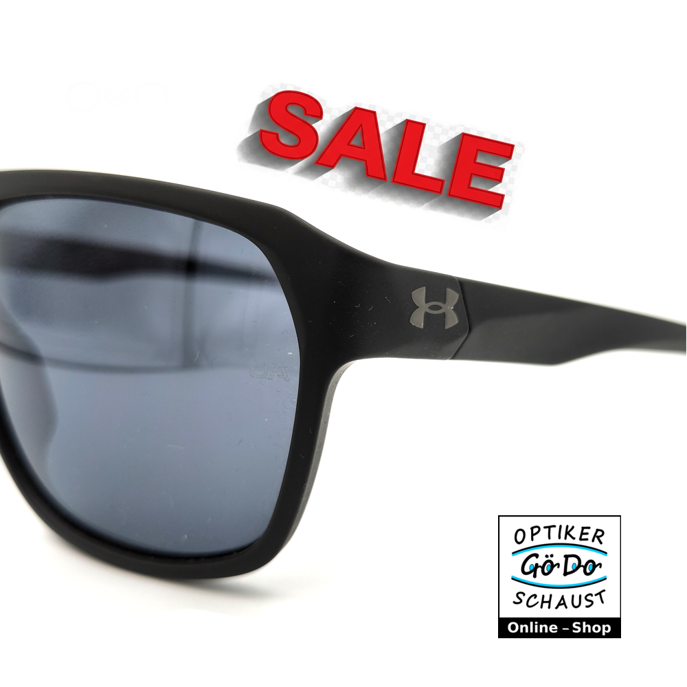 Detailaufnahme der grauen Gläser der UA Dominate 003/KA mit sichtbarem Abperleffekt durch die oleophobe Beschichtung.